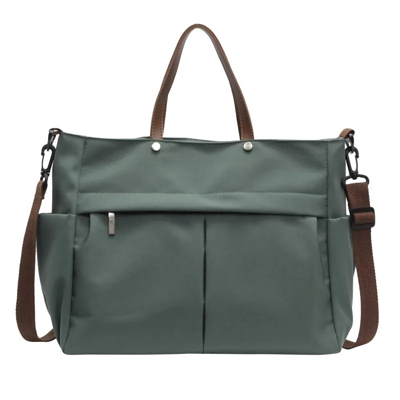 Women's nylon crossbody tote shoulder bag in black colour with measurements 39x14x28cm