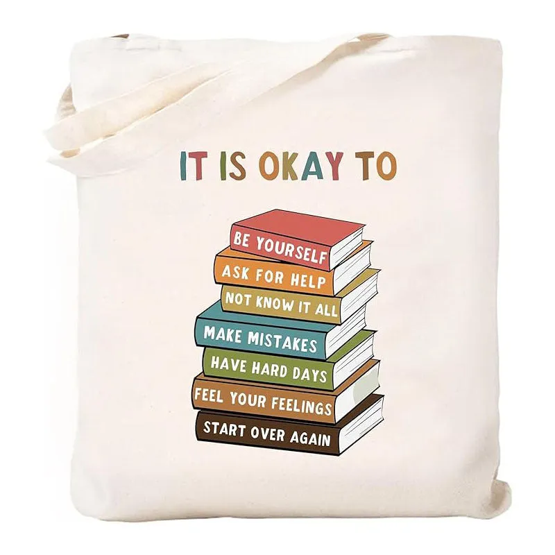 White canvas hand shopping bag with Halloween digital print, 34 by 42 centimetres, on plain background