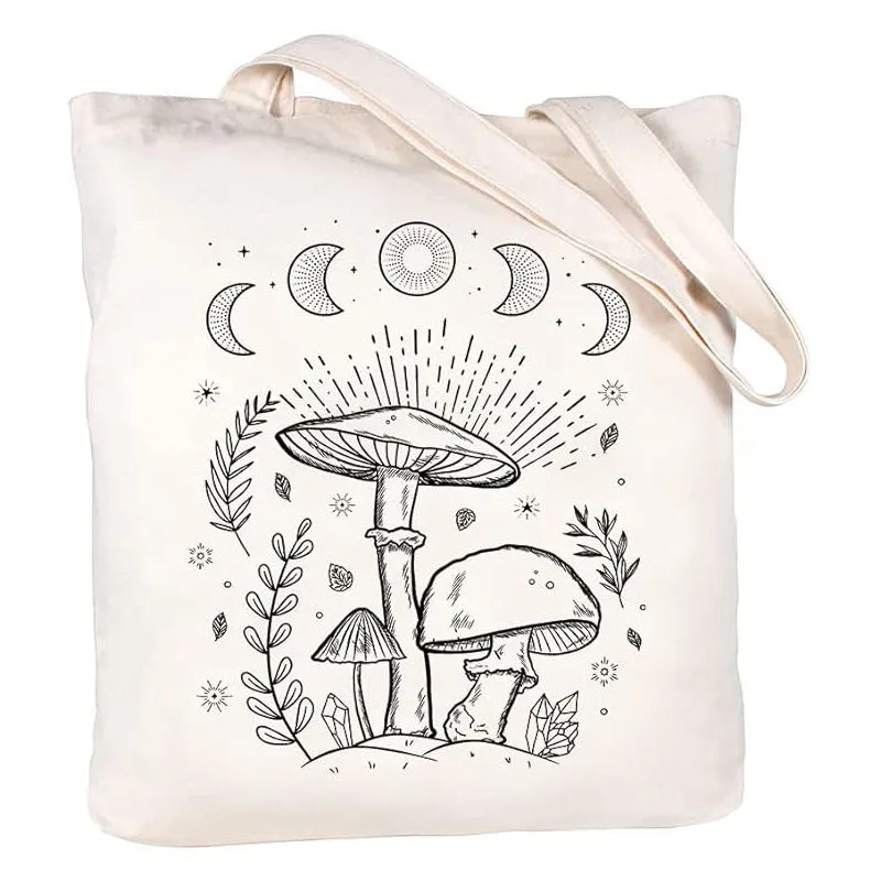 White canvas hand shopping bag with Halloween digital print, 34 by 42 centimetres, on plain background