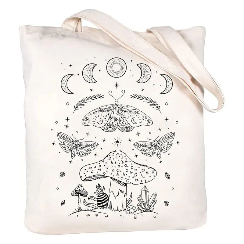 White canvas hand shopping bag with Halloween digital print, 34 by 42 centimetres, on plain background
