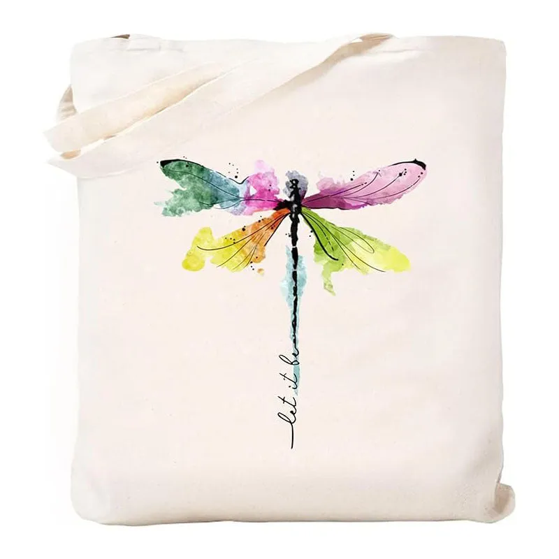 White canvas hand shopping bag with Halloween digital print, 34 by 42 centimetres, on plain background