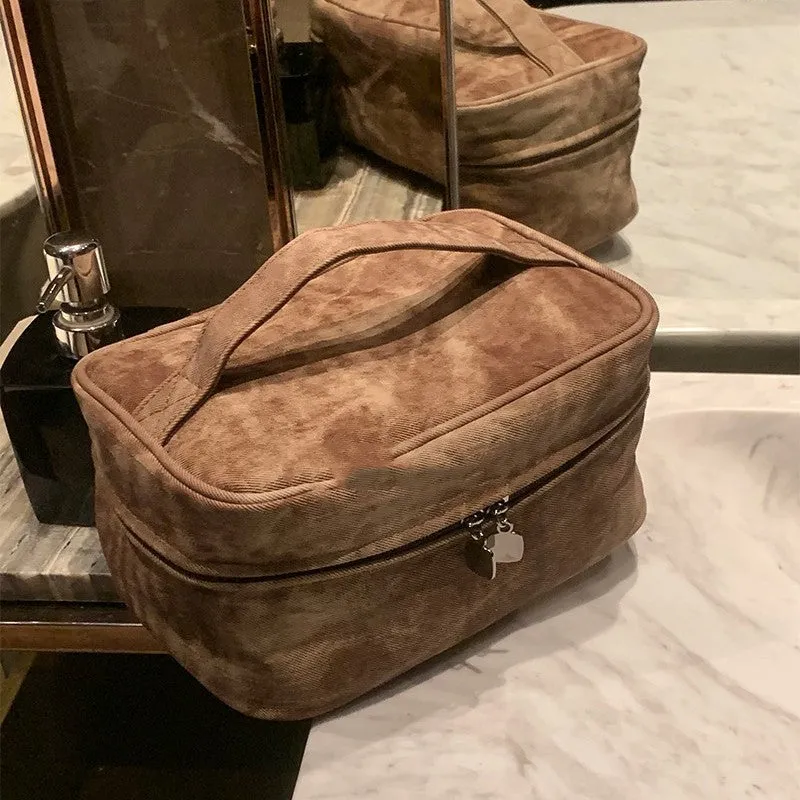Brown PU leather portable partition storage handbag with zipper closure, compact 23x11.5x15.5cm size
