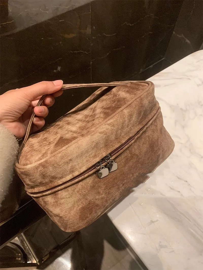 Brown PU leather portable partition storage handbag with zipper closure, compact 23x11.5x15.5cm size