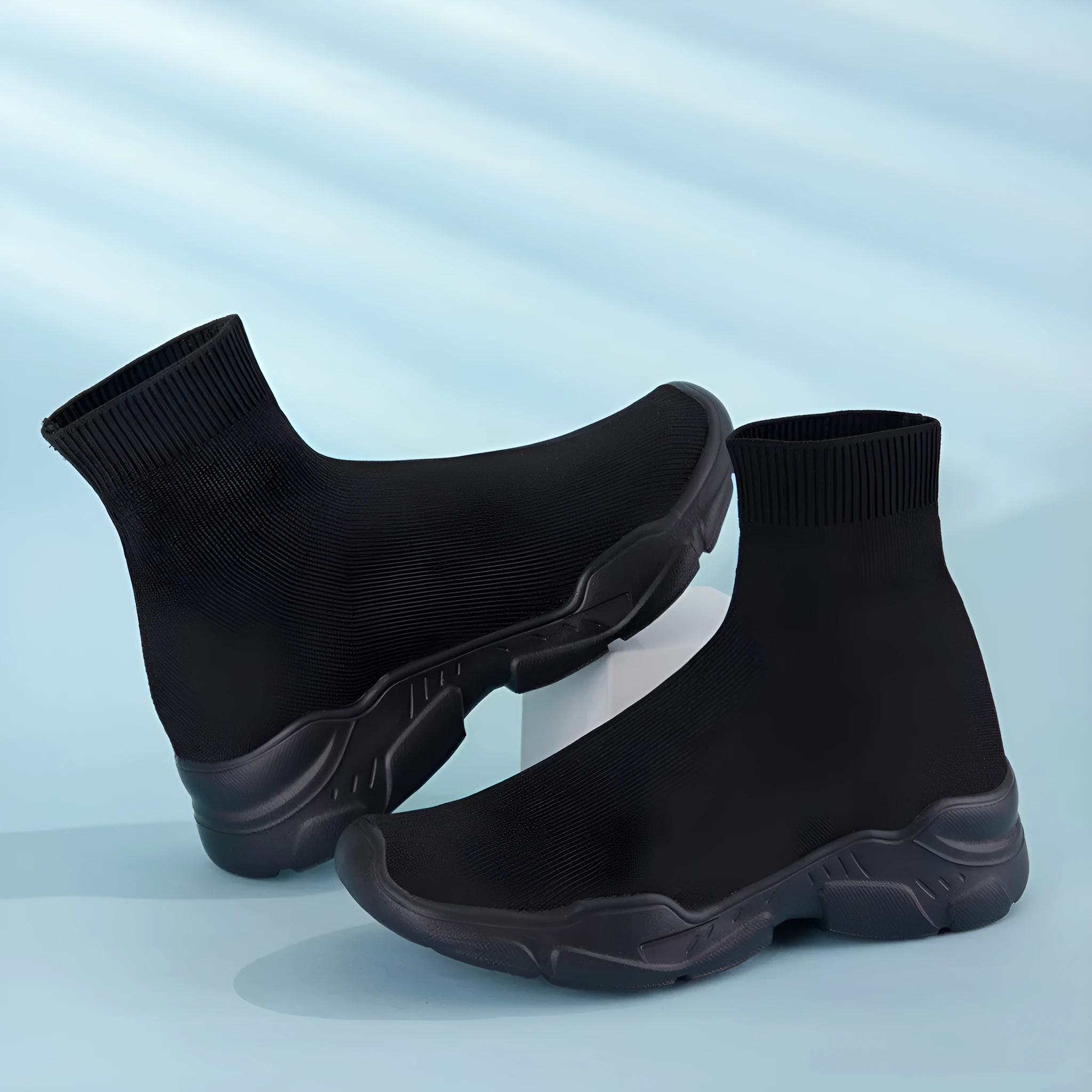 Thick-soled slip-on casual shoes in black with fabric upper and round toe