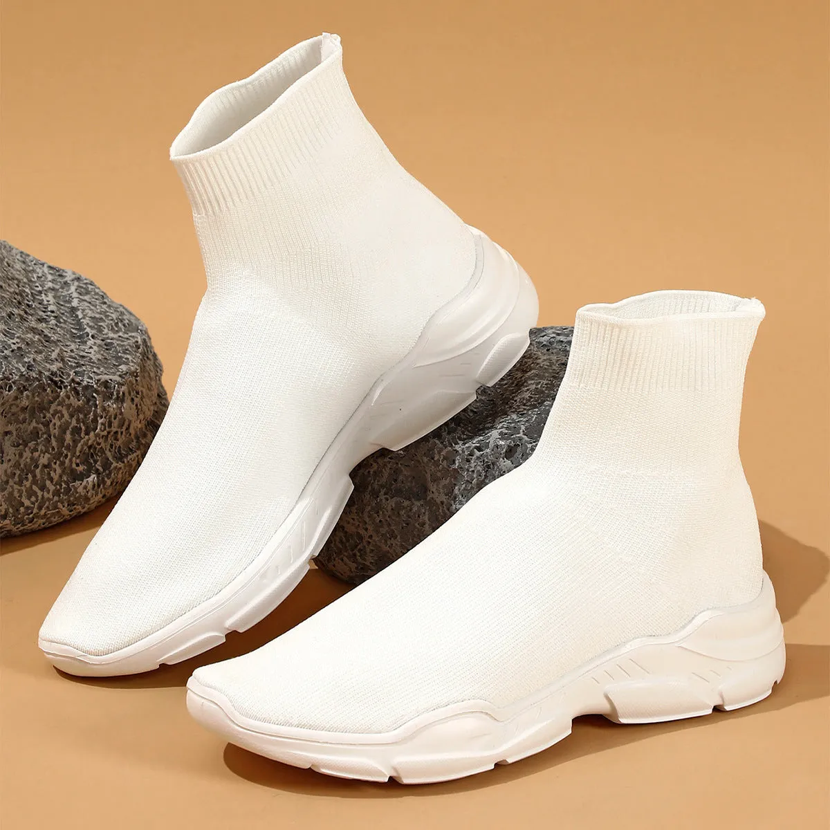 Thick-soled slip-on casual shoes in black with fabric upper and round toe