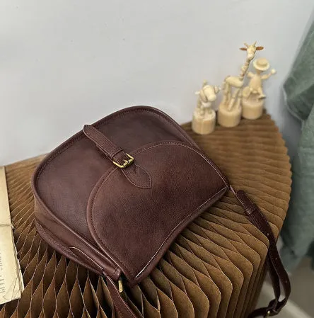 Brown genuine cowhide leather retro messenger bag with flap closure and crossbody strap