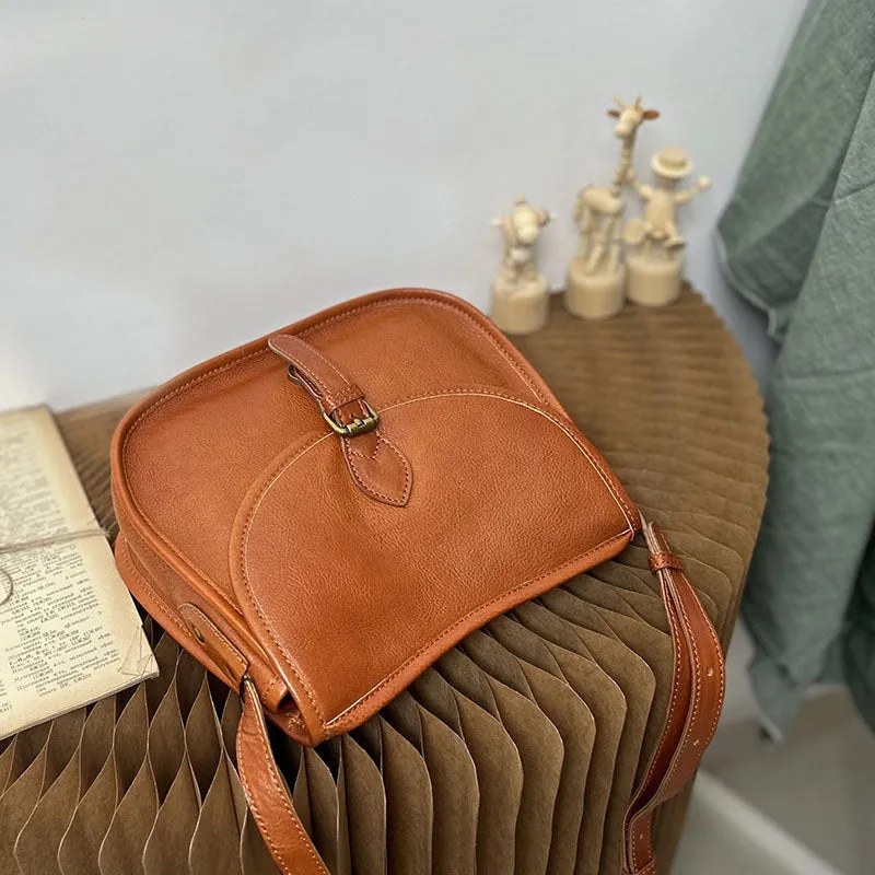 Brown genuine cowhide leather retro messenger bag with flap closure and crossbody strap