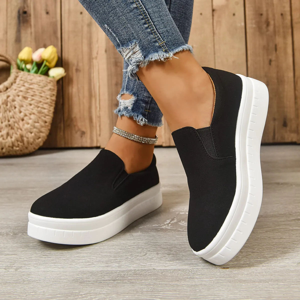 Women's round-toe thick platform sole flats in black, PU upper, elastic band, side view