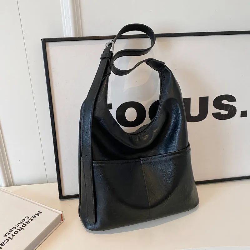 Women's large-capacity soft PVC shoulder bag bucket shape with stitching in beige white colour