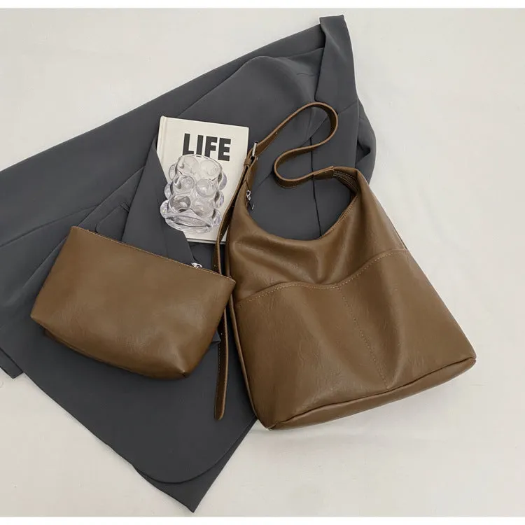 Women's large-capacity soft PVC shoulder bag bucket shape with stitching in beige white colour