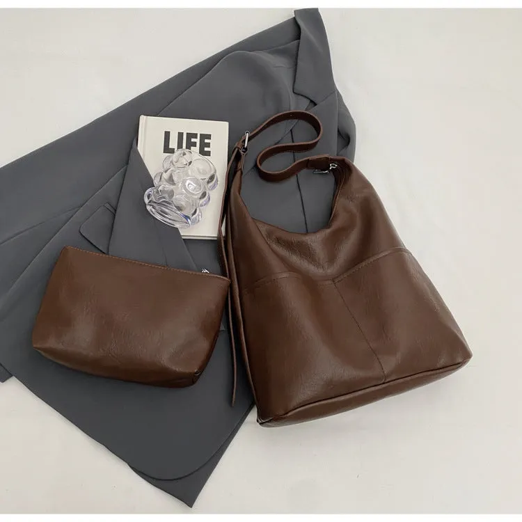 Women's large-capacity soft PVC shoulder bag bucket shape with stitching in beige white colour