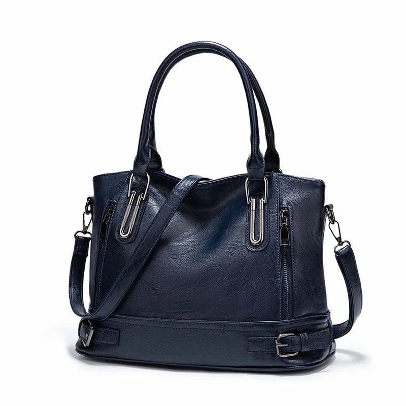 Women's PU leather handbag in black, horizontal square shape, with crossbody strap and sewing line detail