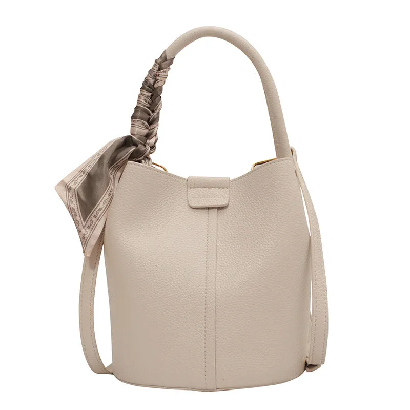 Lychee pattern textured PU handbag women's cylindrical western style bag with sandwich pockets