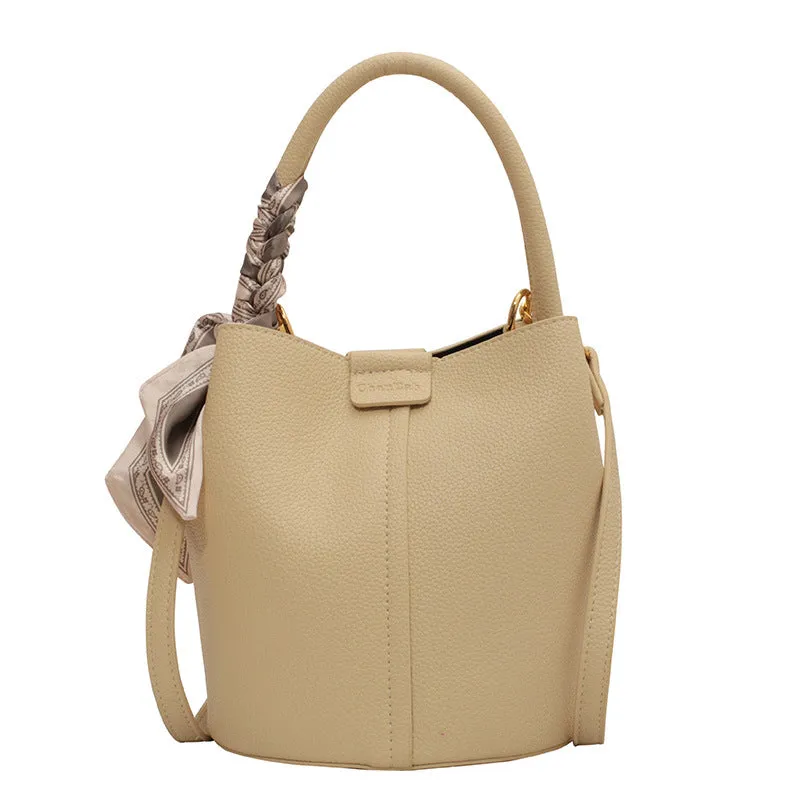 Lychee pattern textured PU handbag women's cylindrical western style bag with sandwich pockets