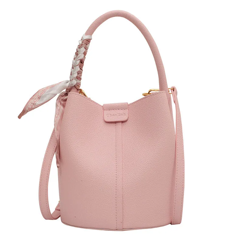 Lychee pattern textured PU handbag women's cylindrical western style bag with sandwich pockets