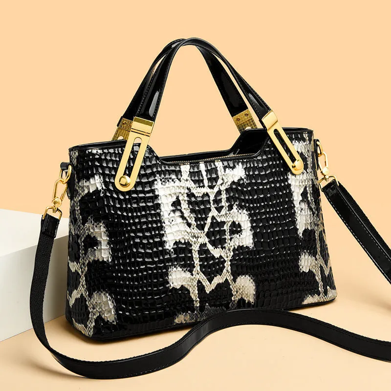 Black horizontal square messenger bag with chain strap and multiple compartments