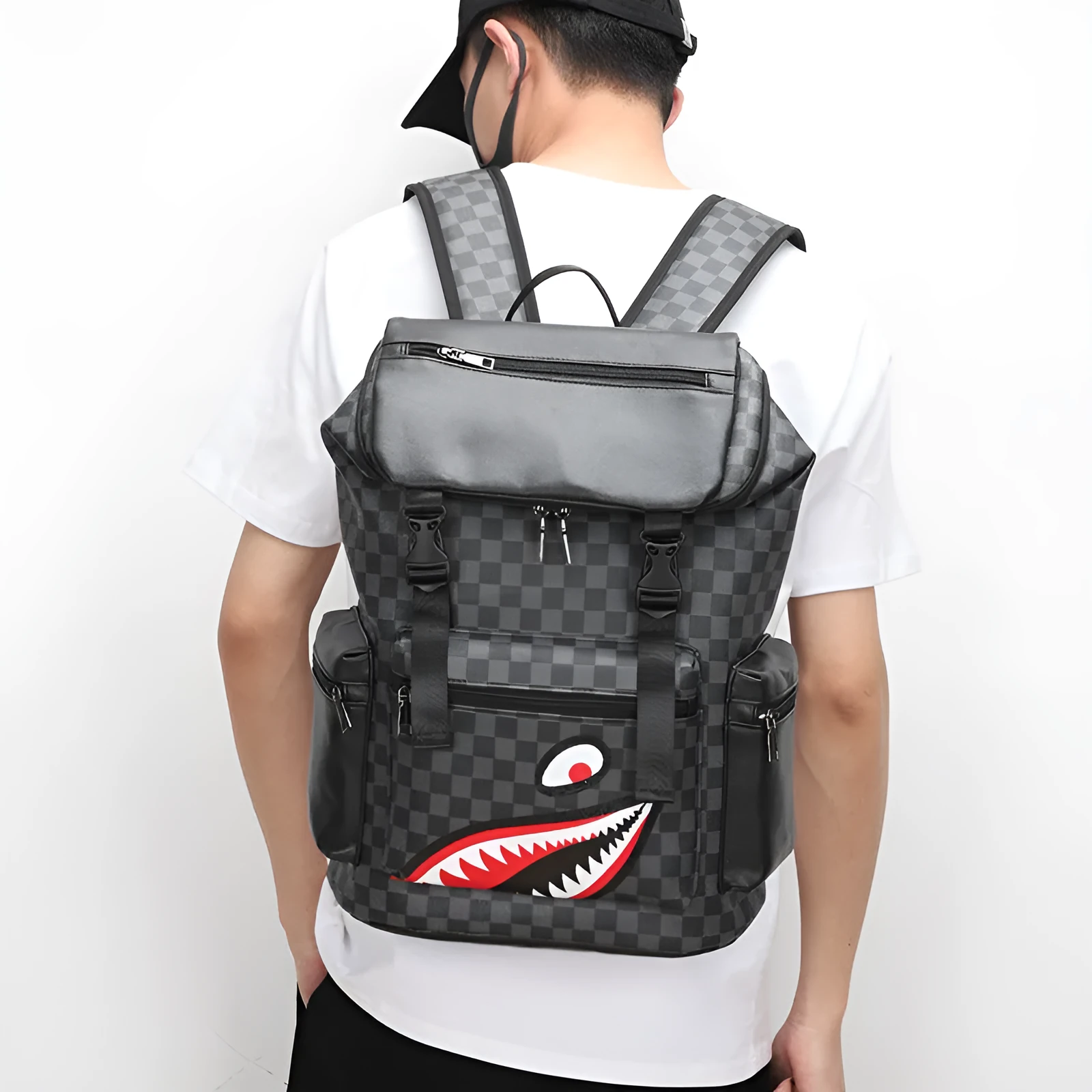 Korean casual checkered printed large backpack in PU leather with curved shoulder straps.