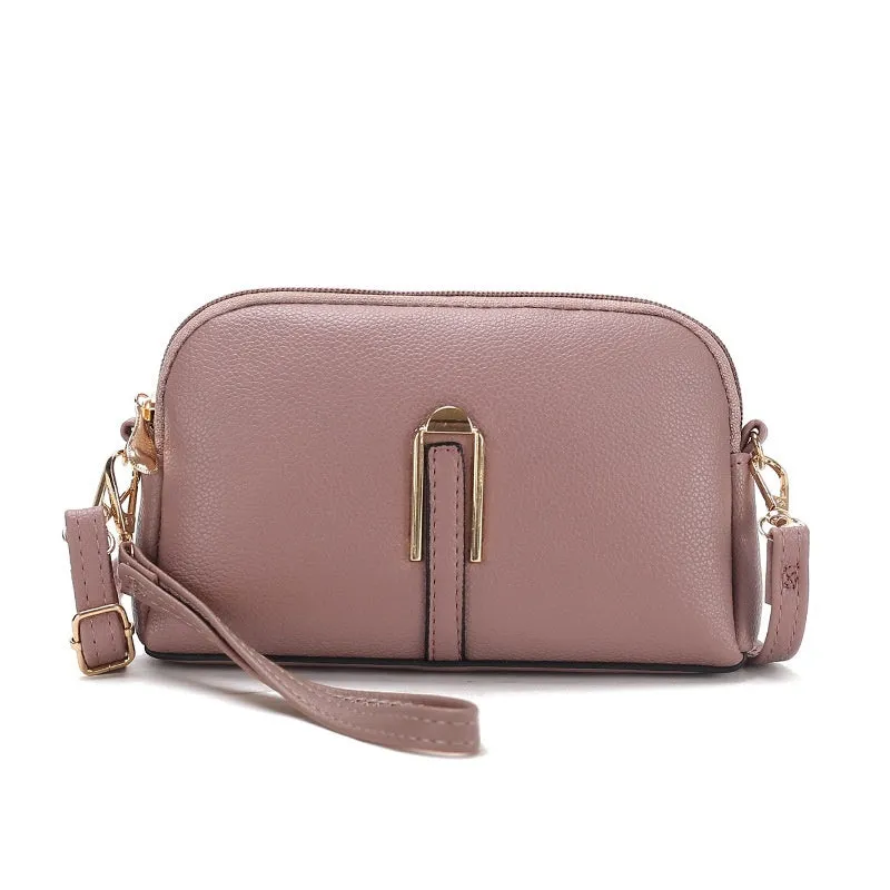 Women's solid colour PU messenger bag with stitching details and shell shape