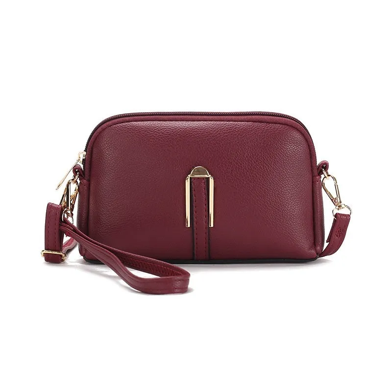 Women's solid colour PU messenger bag with stitching details and shell shape