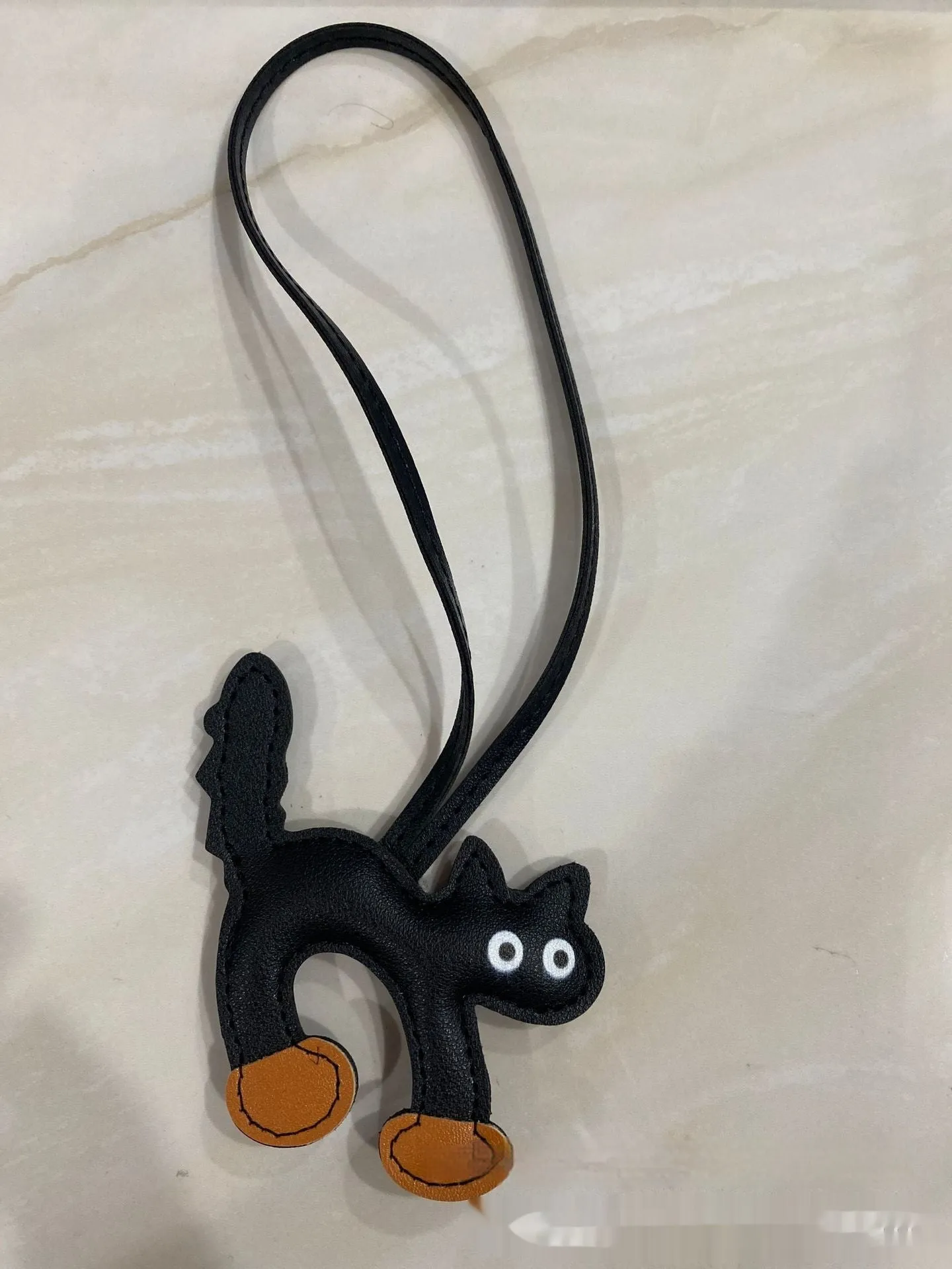 Mini PU leather cat bag pendant animal pattern 8.5x9cm in black on white background