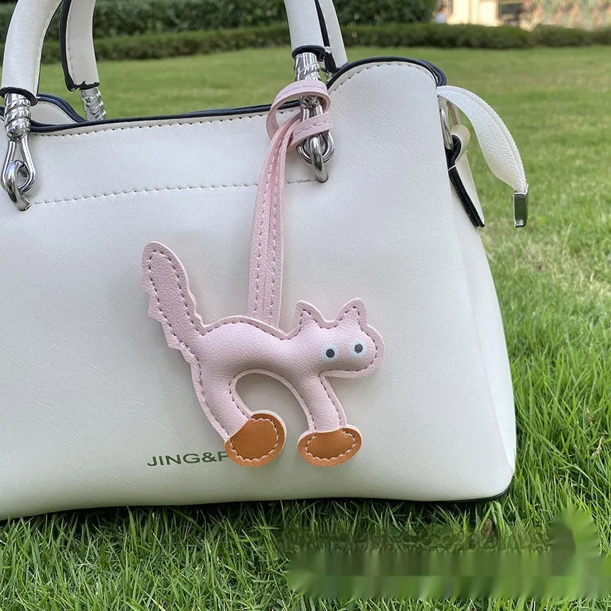 Mini PU leather cat bag pendant animal pattern 8.5x9cm in black on white background