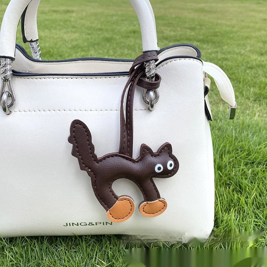 Mini PU leather cat bag pendant animal pattern 8.5x9cm in black on white background