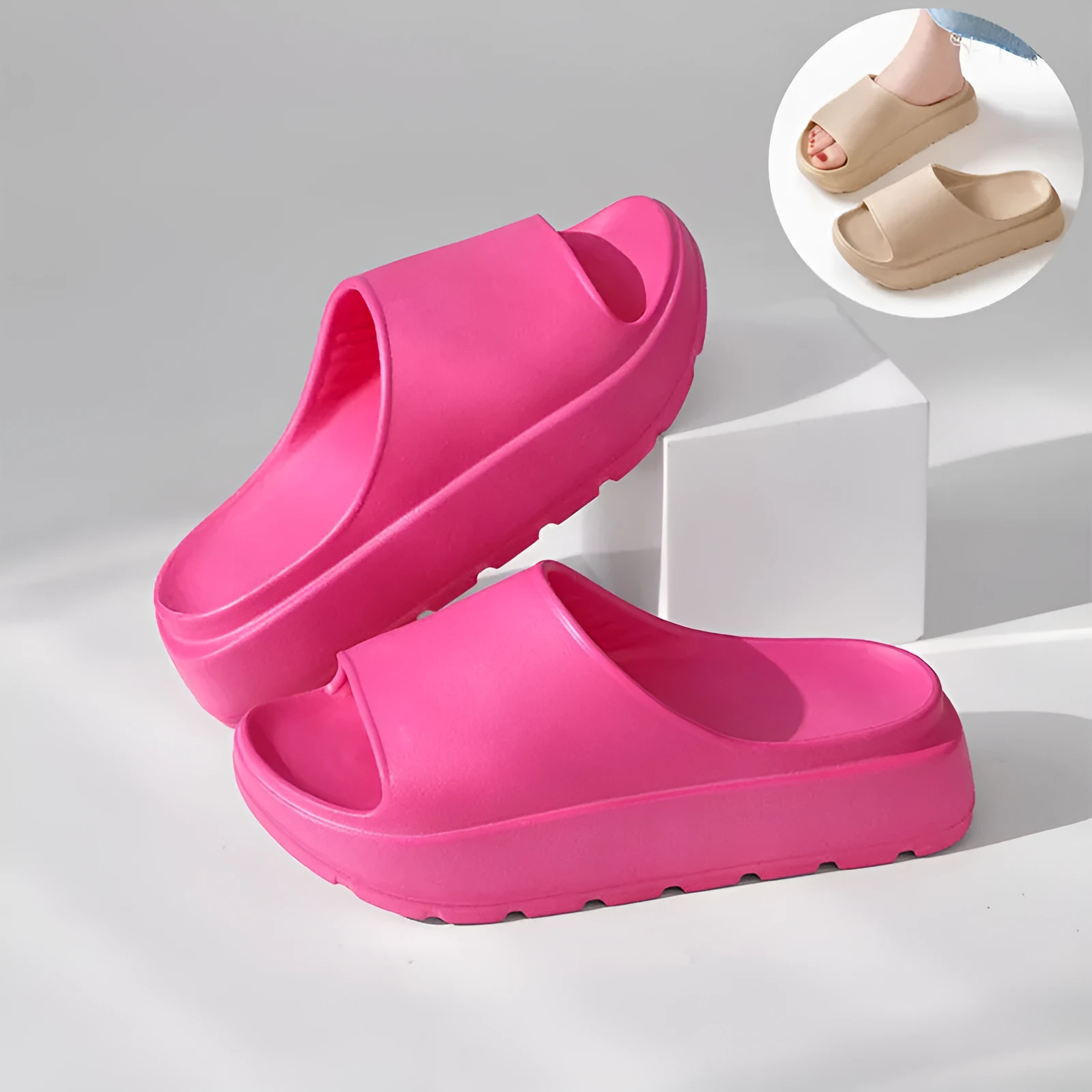 Women's beige fish mouth style EVA slippers with a thick sole, shown on a sandy beach background.