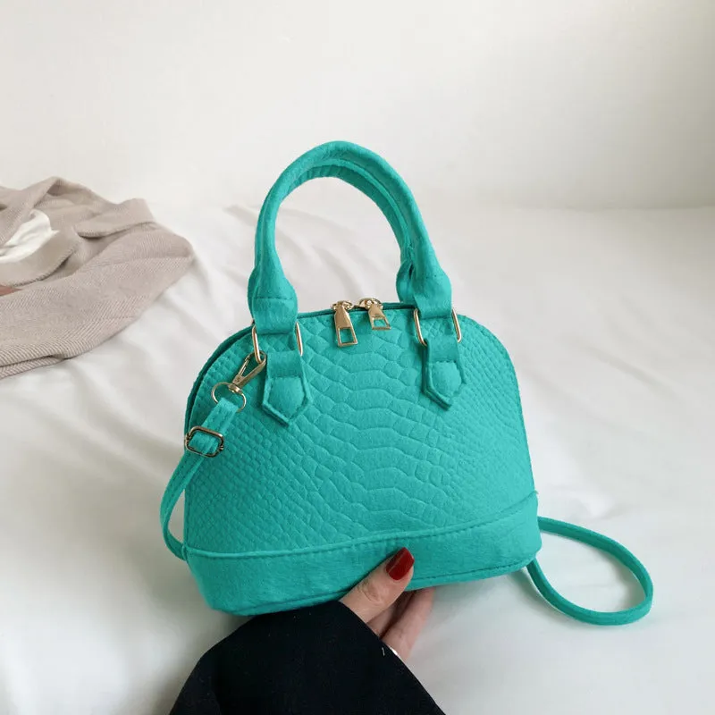 Women's felt shell-shape crossbody bag in khaki with embossing detail and single strap