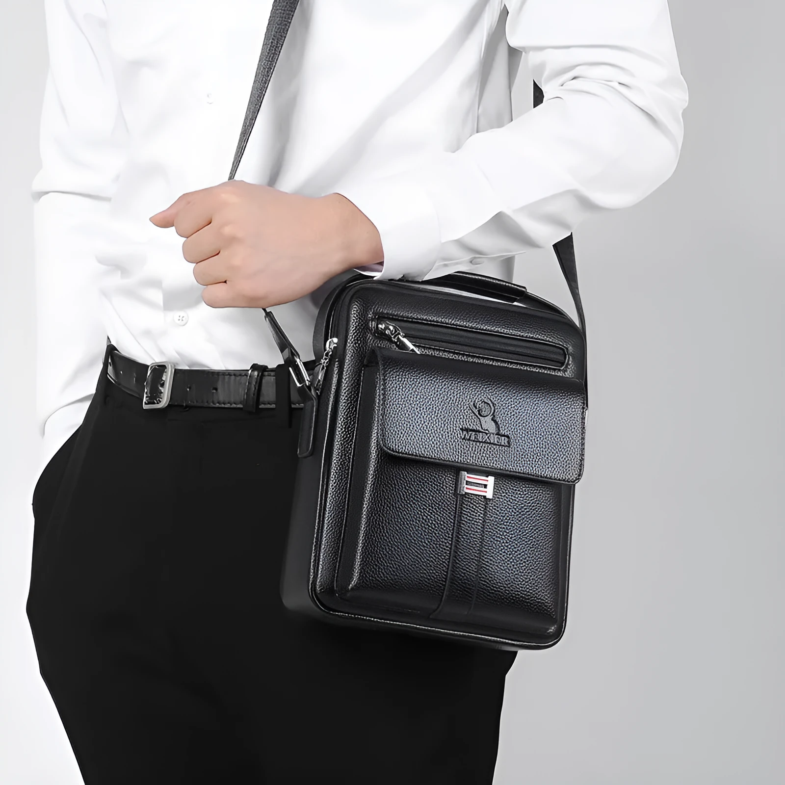 Men’s PU leather crossbody shoulder bag in solid colour with visible sewing line, waterproof for business travel