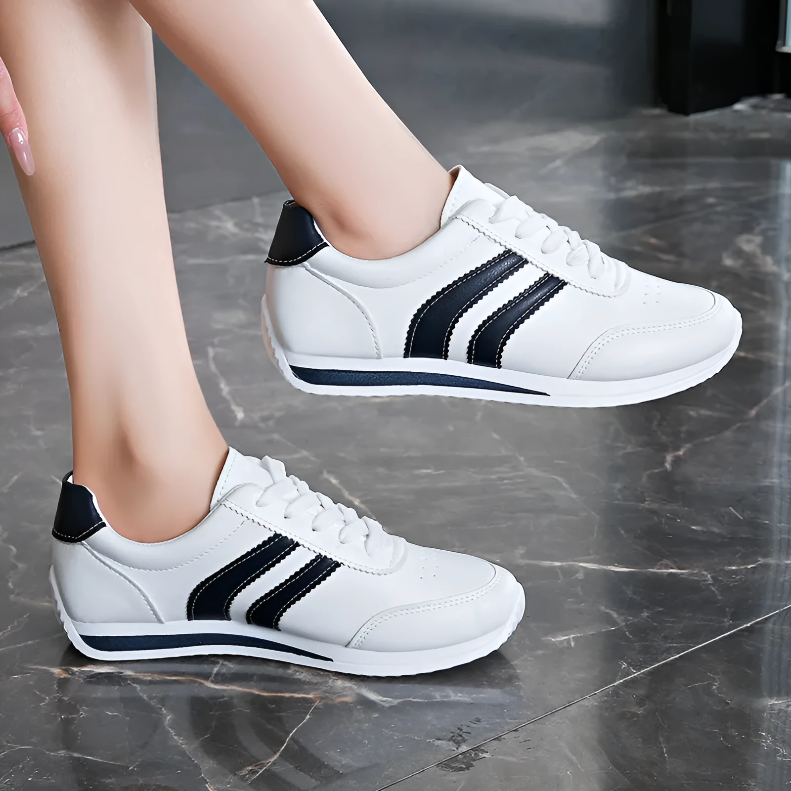 Blue casual lace up soft bottom sneaker with rubber sole and round toe, low top design