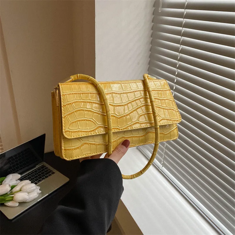 Small portable shoulder messenger bag in hard box shape with stone pattern finish