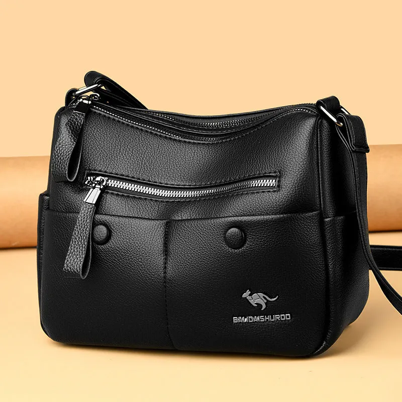 Soft PU leather women's crossbody bag in horizontal square design with multiple internal compartments