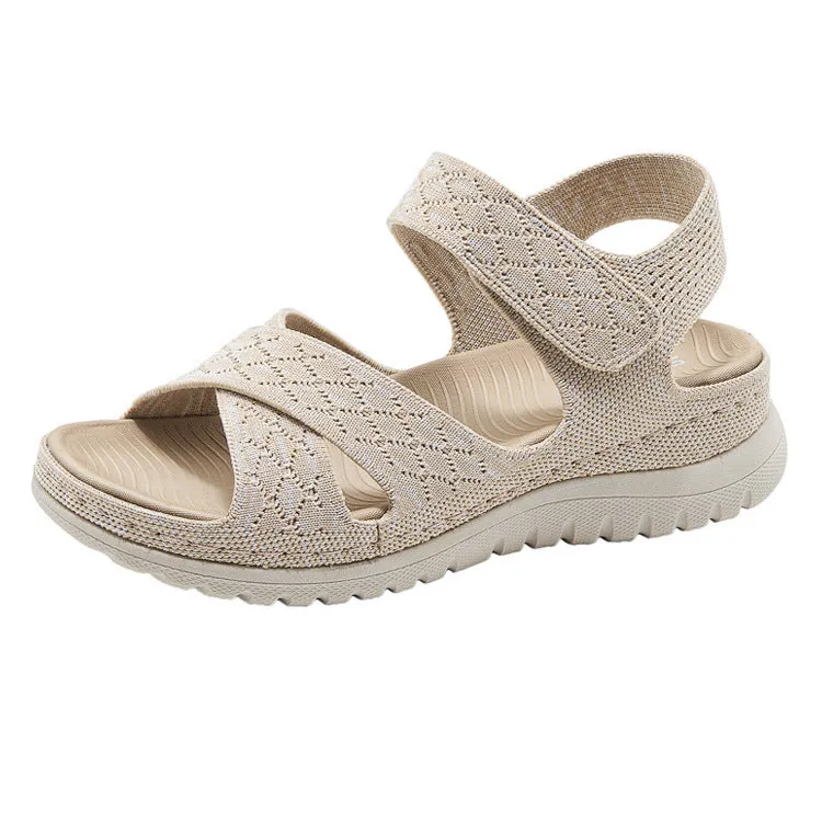 Plus size flat sandals in apricot with Flyknit upper, PVC sole, and Velcro strap.