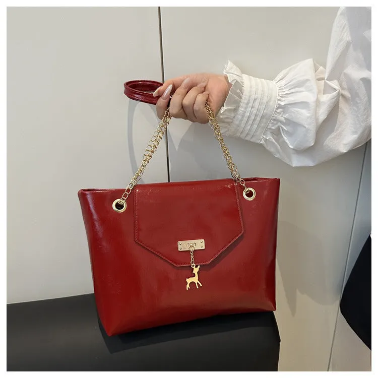 Large capacity chain shoulder bag for women in black, soft PU, horizontal square shape with chain strap