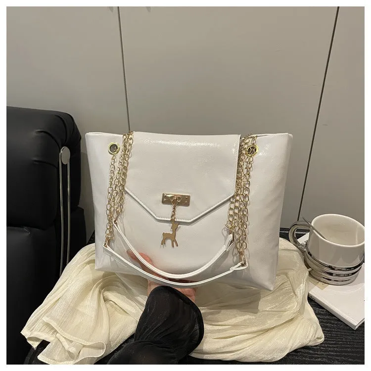 Large capacity chain shoulder bag for women in black, soft PU, horizontal square shape with chain strap