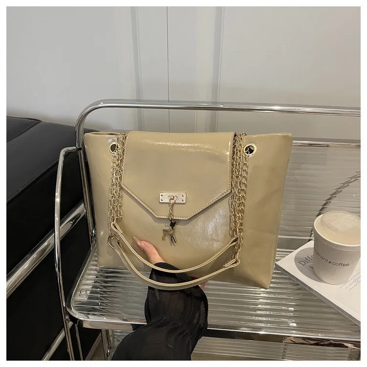Large capacity chain shoulder bag for women in black, soft PU, horizontal square shape with chain strap