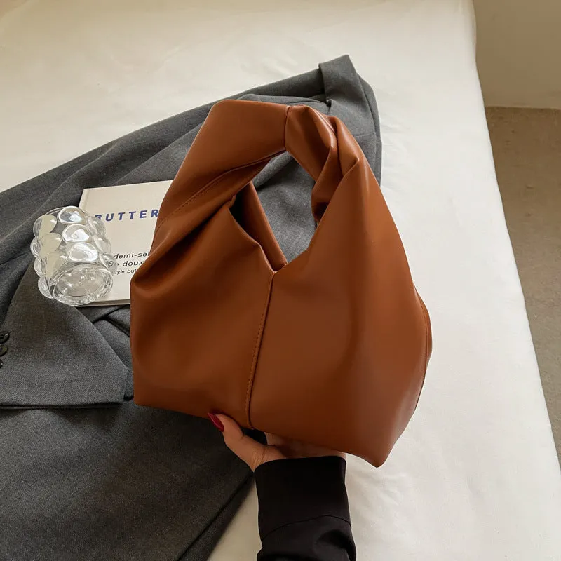 Women's casual PU leather foldable dumpling handbag in multiple colours showing sandwich pocket.