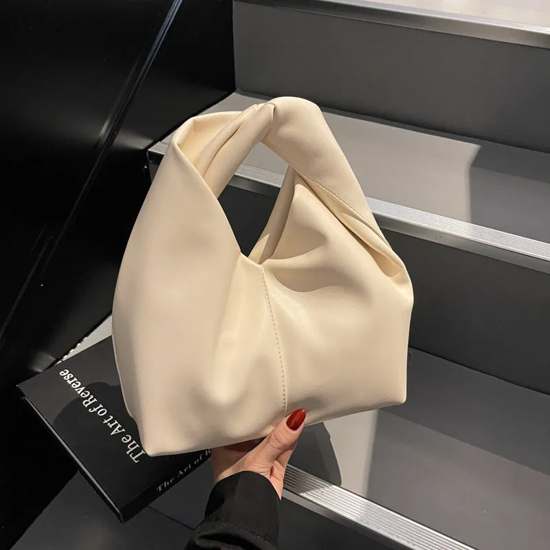 Women's casual PU leather foldable dumpling handbag in multiple colours showing sandwich pocket.