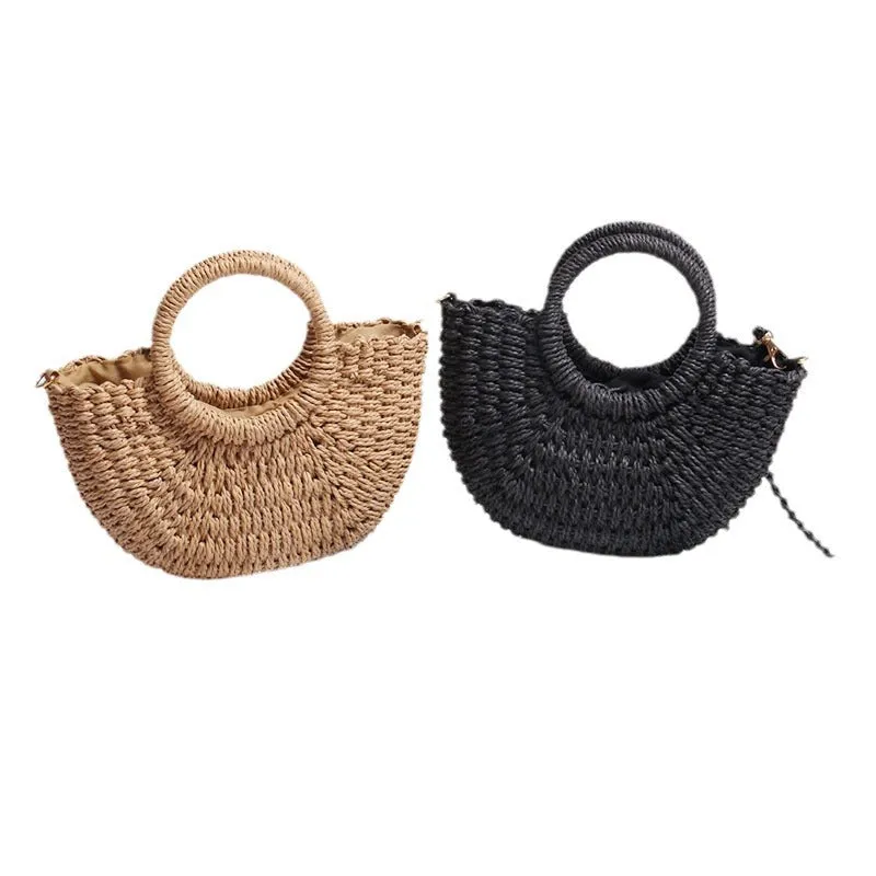 Beach mini straw bag woven dumpling shape in light blue colour with open pocket
