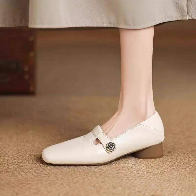 Retro square head genuine leather women shoes in beige with mid heel and square heel on a grey background