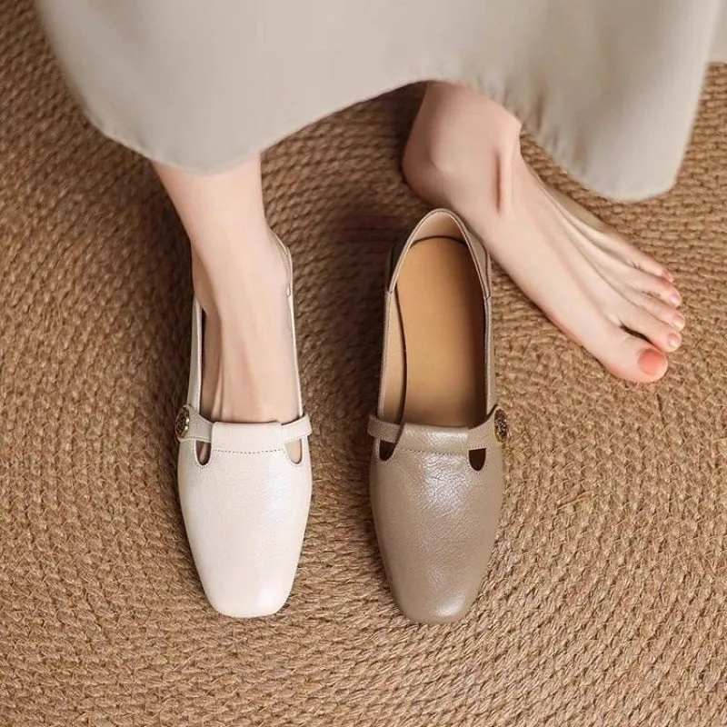 Retro square head genuine leather women shoes in beige with mid heel and square heel on a grey background