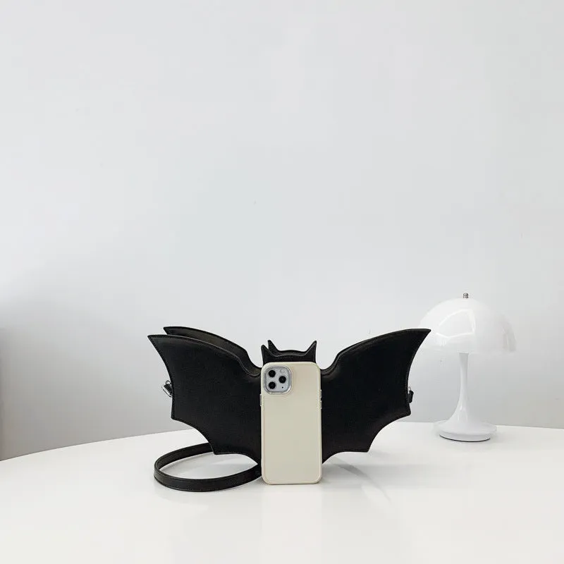 Black PU Halloween bat shaped shoulder messenger bag with crossbody strap on white background