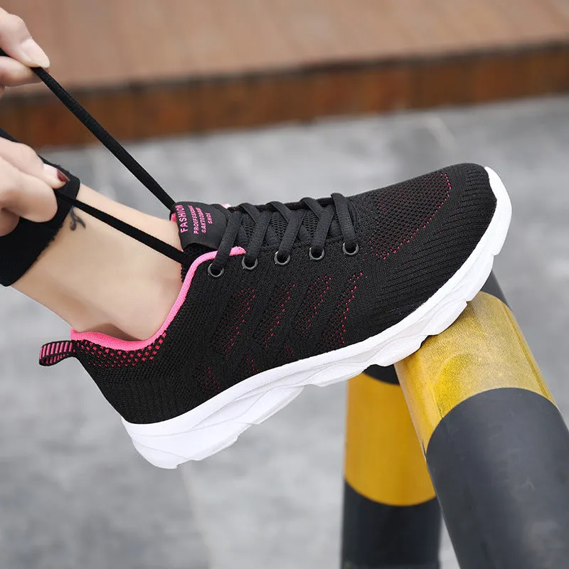 Women's sports running shoes in white with mesh and Flyknit upper, flat heel, and lace-up front