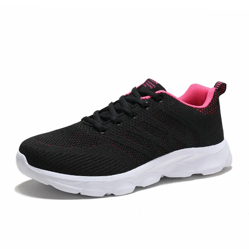 Women's sports running shoes in white with mesh and Flyknit upper, flat heel, and lace-up front