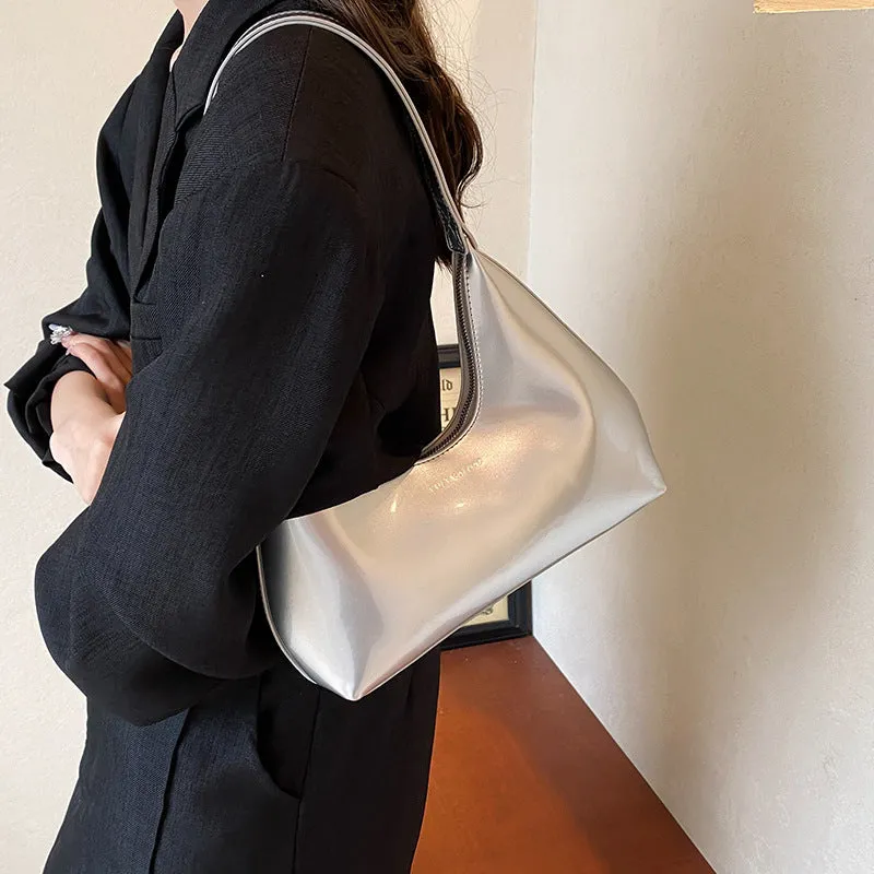 French style PU leather shoulder bag with sewing line detail and dumpling shape, available in multiple colours