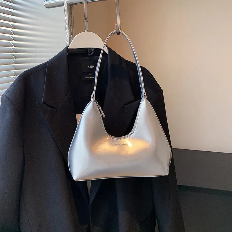 French style PU leather shoulder bag with sewing line detail and dumpling shape, available in multiple colours