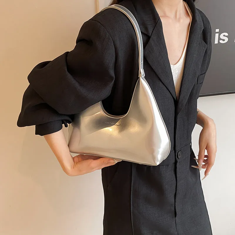 French style PU leather shoulder bag with sewing line detail and dumpling shape, available in multiple colours