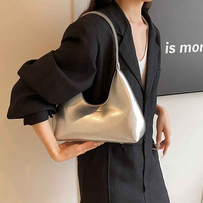 French style PU leather shoulder bag with sewing line detail and dumpling shape, available in multiple colours