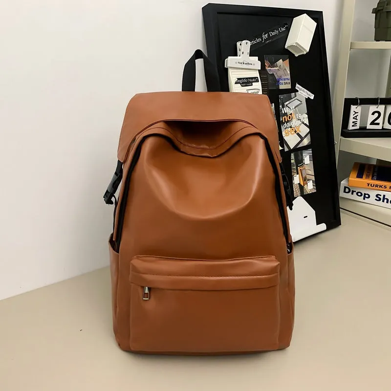 Travel Out large capacity PU leather backpack in black with air pillow belt and sewing thread design, 33x16x46cm