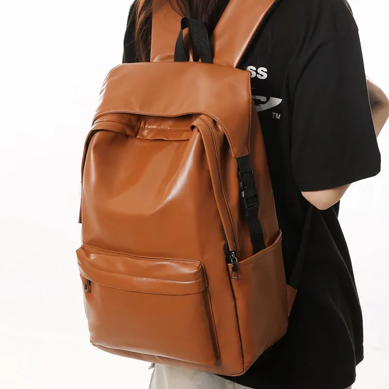 Travel Out large capacity PU leather backpack in black with air pillow belt and sewing thread design, 33x16x46cm